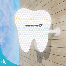 Werbeschild für Zahnarztpraxis in Zahnform